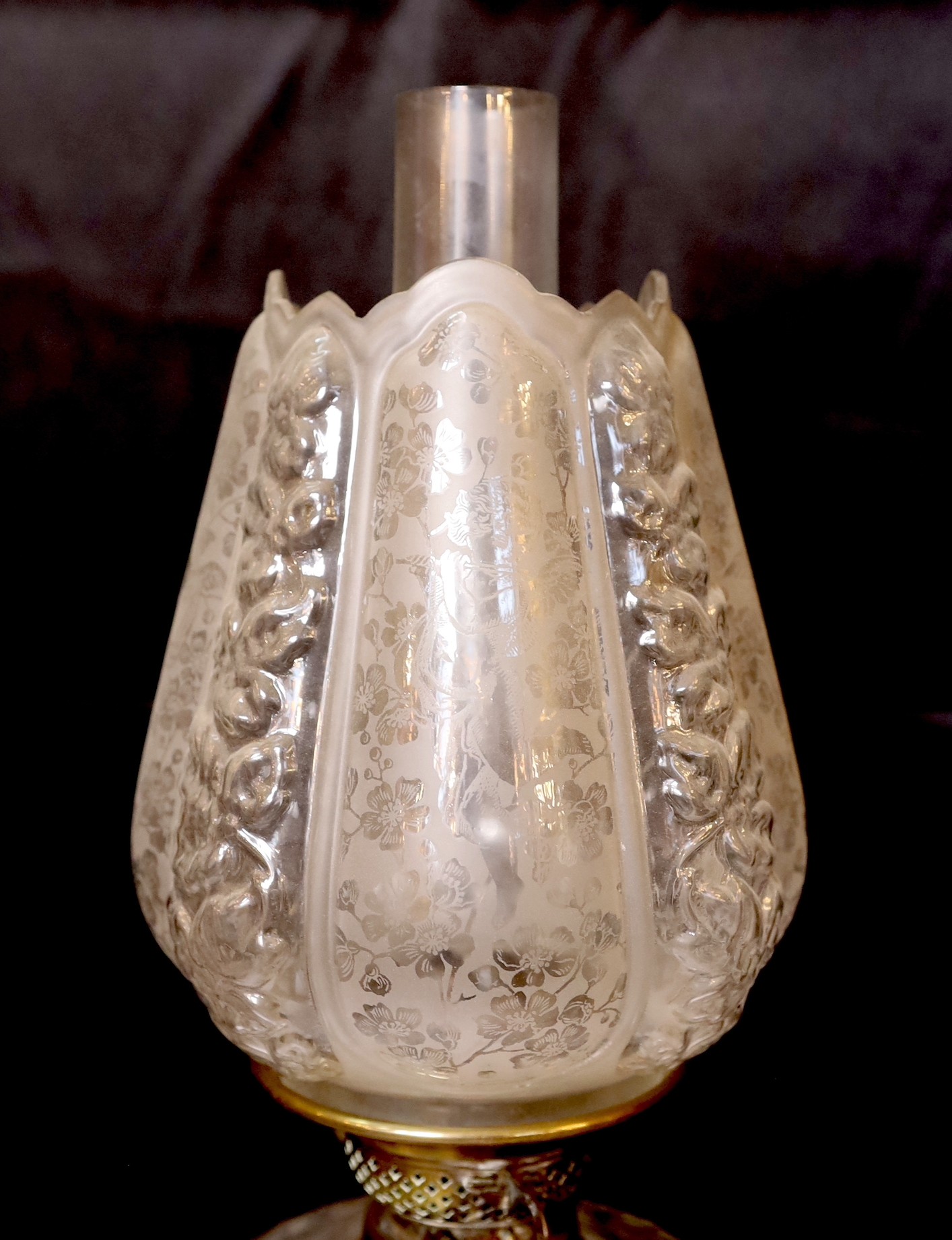 A late Victorian brass and cut glass oil lamp with duplex mechanism and frosted glass shade, height overall 65cm